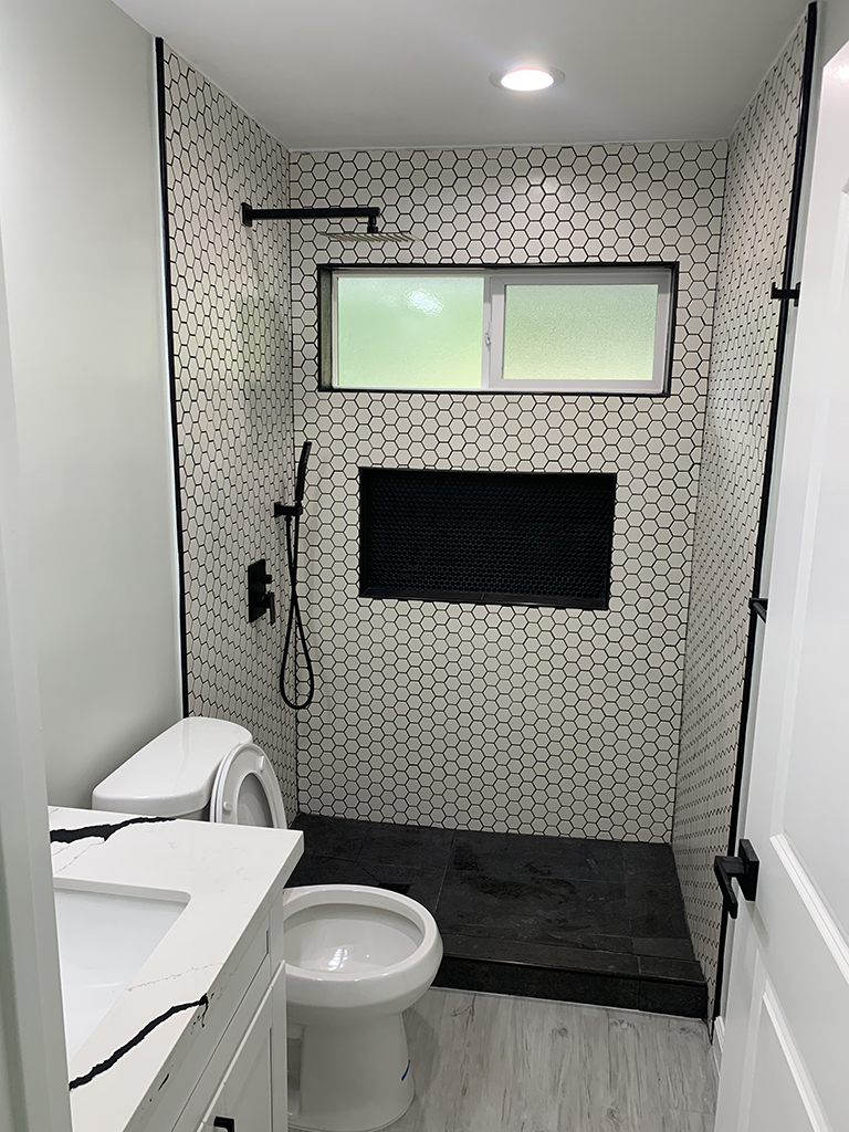 Bathroom tile and fixture detail
